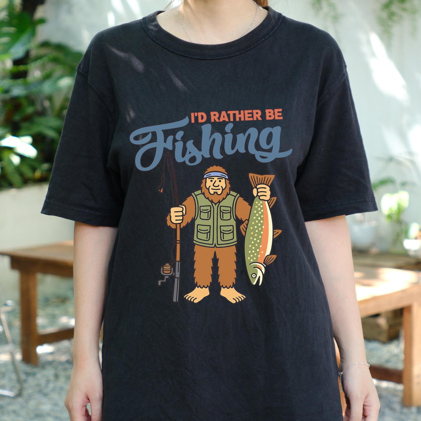 I'd Rather Be Fishing Bigfoot Shirt, Funny Fisherman Tee for Men, Sasquatch Holding Fish Graphic T-shirt, Outdoors Lake Fishing Gift