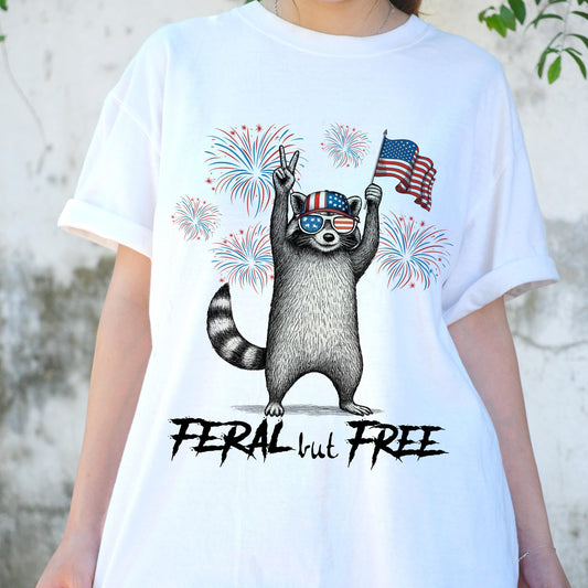 Feral But Free Raccoon Shirt, Funny 4th of July USA Tee, Patriotic Trash Panda T-Shirt, Fireworks America Animal Shirt, Freedom Gift