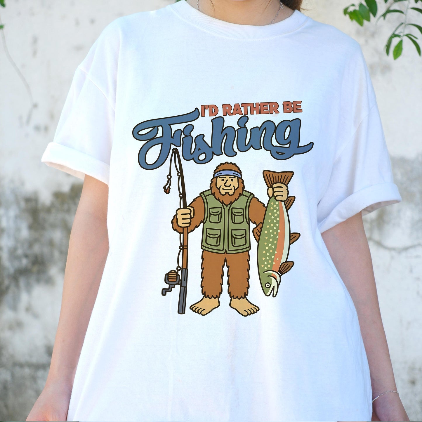 I'd Rather Be Fishing Bigfoot Shirt, Funny Fisherman Tee for Men, Sasquatch Holding Fish Graphic T-shirt, Outdoors Lake Fishing Gift